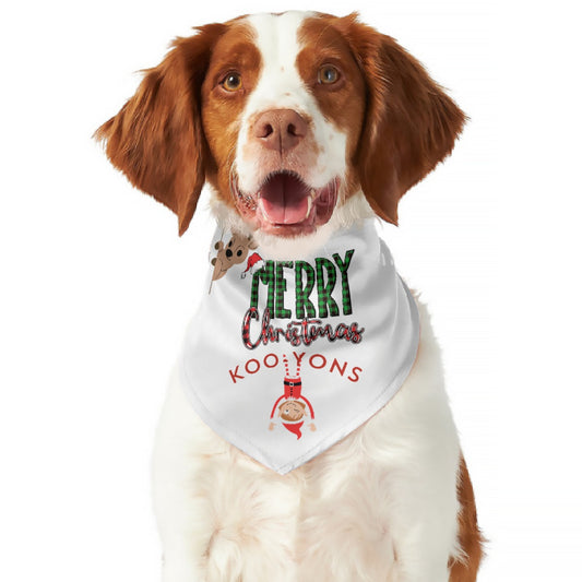Dog wearing a Christmas-themed bandana with text and graphics on a white background