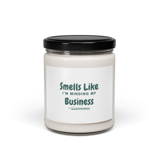Candle jar with a label reading 'Smells Like I'm Minding My Business' on a white background